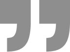 Two stylized quotation marks representing a testimonial or quote.